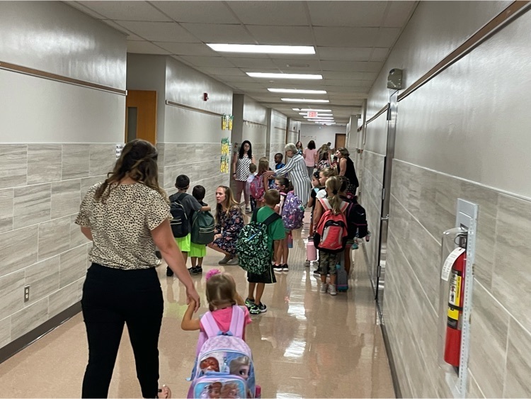 Students walking down the hallway to their classrooms on Day 1.