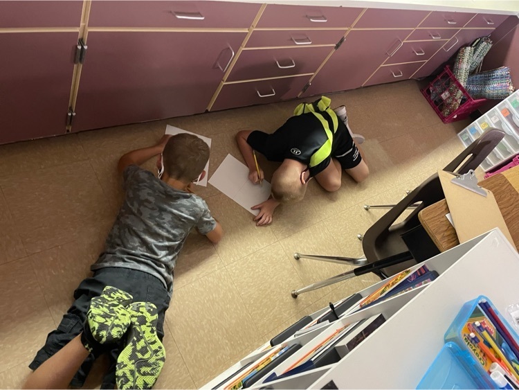 students working on the floor