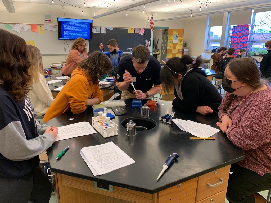 Students testing DNA samples.