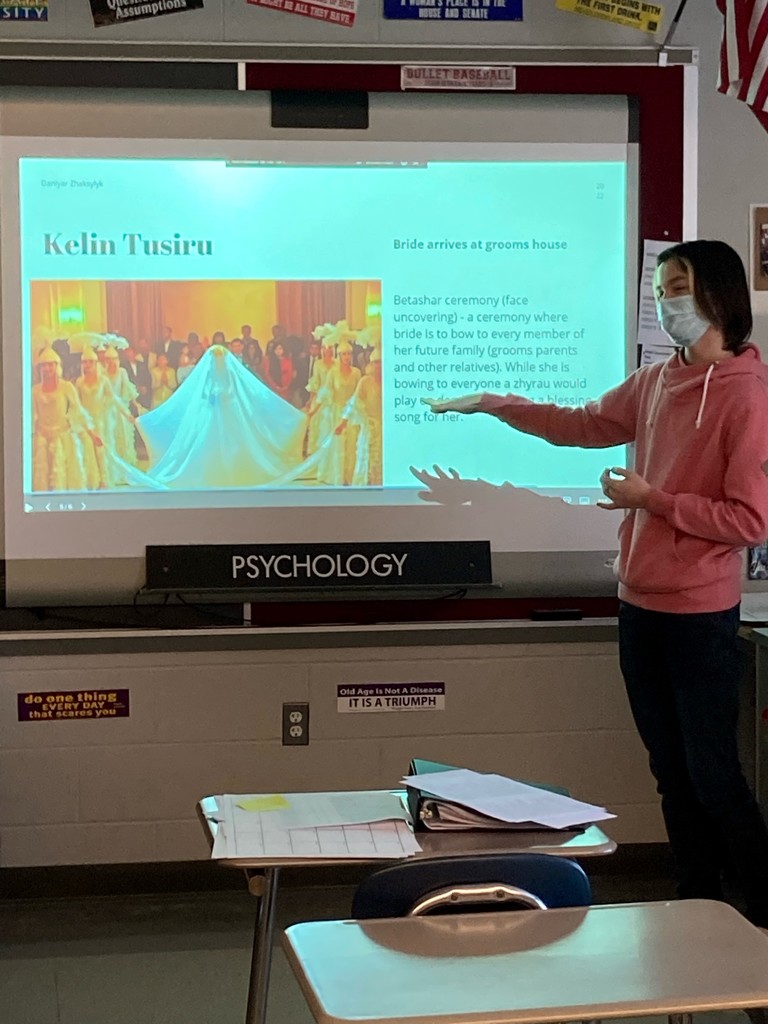 Students presents information about wedding traditions. 
