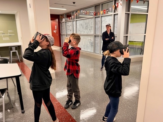 Students exploring Macy's Day Parade Tour in VR.