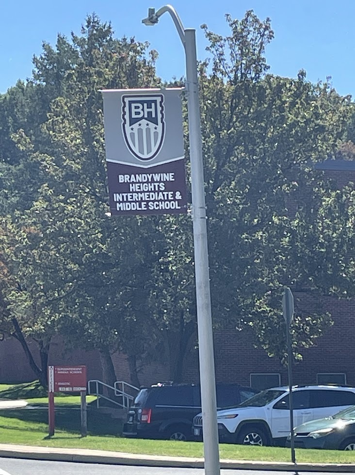 Avenue Sign on lamp post that says 'Brandywine Heights Intermediate & Middle School'.